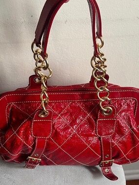 Red Quilted Shoulder Bag with Gold Chain Straps